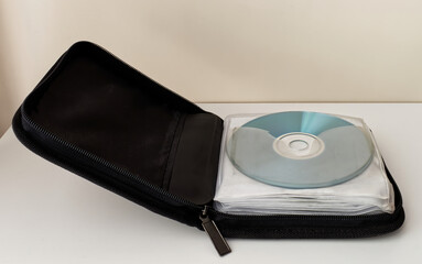 Black Case for CD and DVD on white background. Technology from the 90s.