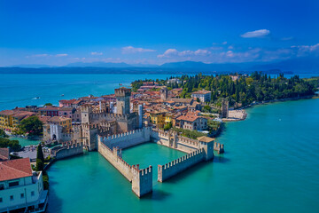 Italian castle on Lake Garda. Sirmione aerial view. Top view, historic center of the Sirmione peninsula, lake garda. Aerial panorama of Sirmione. Lake Garda, Sirmione, Italy.