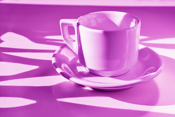 White coffee cup on colored background