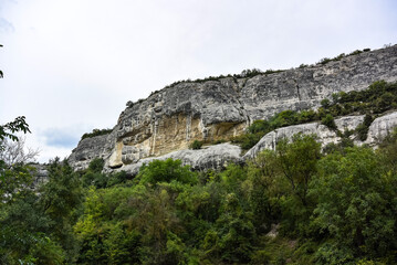 Buildings and structures of the Holy Dormition Monastery in the gorge of St. Mary. Bakhchisarai. August. 2019. Crimea.