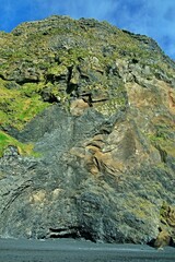 Iceland-view of rock formations Reynisdrangar situated of Reynisfjara beach by the village Vík