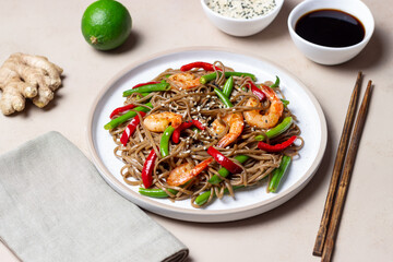 Soba noodles with shrimp, pepper and green beans. Japanese cuisine. Asian food.