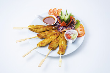 shish kebab on skewers with sauce