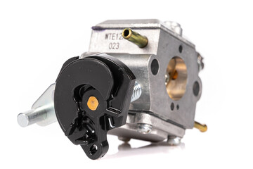 modern carburetor for garden equipment made of aluminum on a white isolated background