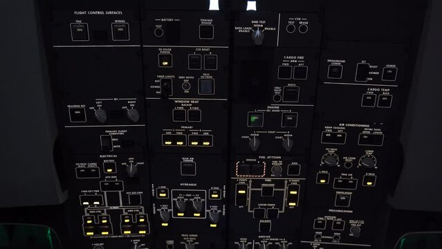 Tilt down on the switches and instruments of a 787 commercial airplane