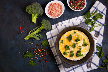 Frittata with broccoli, herbs and spices. Healthy food rich in protein and fiber.