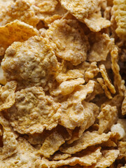 Macro shot. Whole grain crunchy flakes. Lots of objects. Quick breakfast cereals. Useful product, baby, diet food. Vitamins, detox. Cooking, medicine, healthy lifestyle.