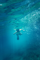 Boy snorkelling undersea
