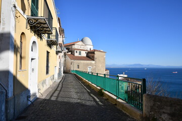 A narrow street overlooking the sea in Raito, a small village on the Amalfi coast in Italy.