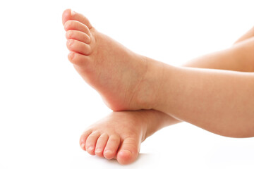 Closeup shot of little child feet and soles.