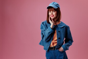 Positive young woman denim clothing fashion posing cap color background unaltered