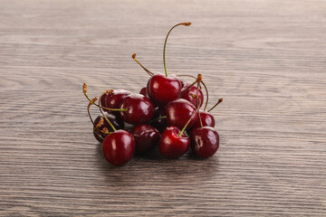 Ripe sweet cherry berries heap