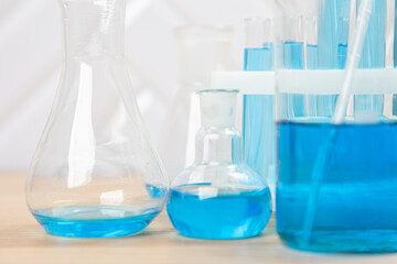 Laboratory glassware with test tubes. flasks, dropper, petri dishes, measuring cups and cylinders for scientific laboratories,