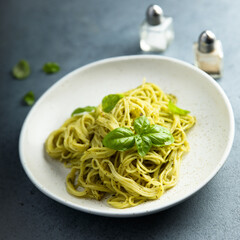 Traditional spaghetti with pesto sauce
