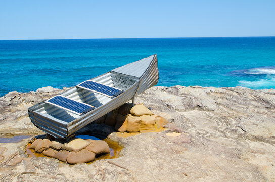 SYDNEY, AUSTRALIA. &ndash; On October 29, 2017. &ndash; " Les st Hill and tin Canoe " is a sculptural artwork by John Blay, Amanda Stuart & Jane Ulman at the Sculpture by the Sea annual events outdoor exhibition.
