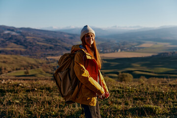 woman tourist mountain top nature travel adventure relaxation
