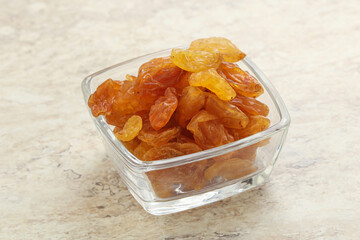 Sweet yellow raisin in the bowl