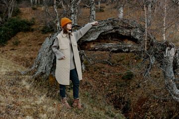 portrait of a woman trees without leaves travel fresh air landscape