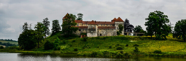 Fototapeta premium View to ancient castle in Svirzh, Ukraine