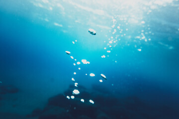 Fototapeta na wymiar Close-up of bubbles undersea