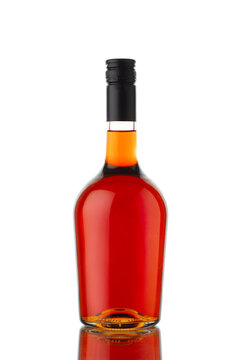 round shape cognac brandy or whisky bottle isolated on white background