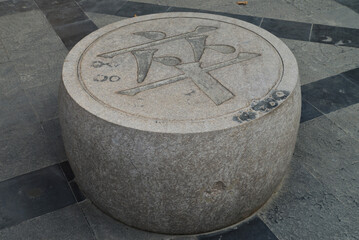 Large stone carving of Chinese chess pieces