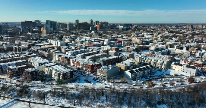 Philadelphia west neighborhood in winter snow. Aerial of urban residential district.