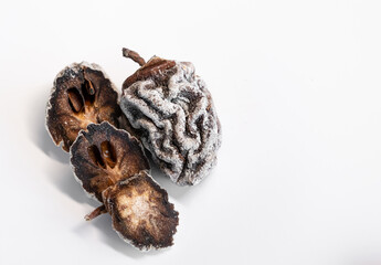 Dried persimmon on a white background. Healthy diet