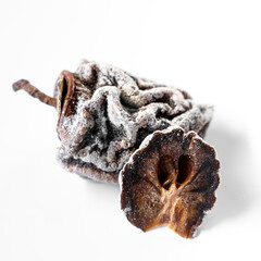 Dried persimmon on a white background. Healthy diet