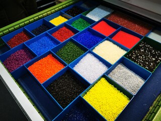 Plastic granules, pellets, colorful - obrazy, fototapety, plakaty