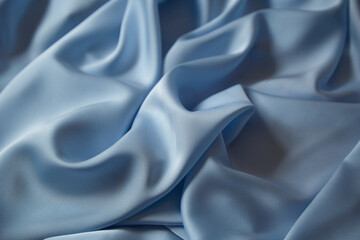 Beautiful draped silk fabric in blue.