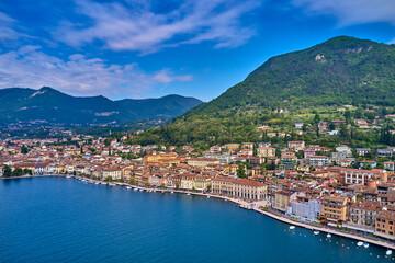 Naklejka na ściany i meble Panorama Salò, Italy aerial view. Aerial panorama of the historic part of Salò on Lake Garda. Aerial view of the town on Lake Garda. Panoramic view of the historic part of Salò on Lake Garda Italy.