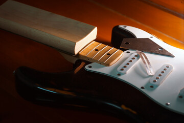 black electric guitar maintenance fret leveling