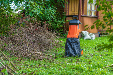 Electric garden shredder of branches and leaves