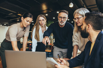 Focused businesspeople having a discussion in an office