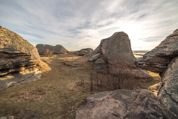 Fototapeta na wymiar Stone remains, old sanctuary, Big Allaki lake, South Ural, Chelyabinsk region, Russia