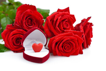 Red rose bouquet with open gift box with heart on a white background. Valentines Day concept.