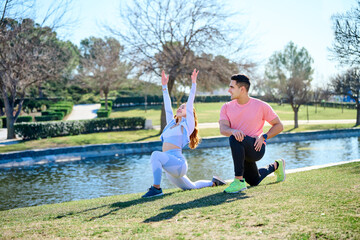 Fototapeta premium Young couple practicing sports outdoors