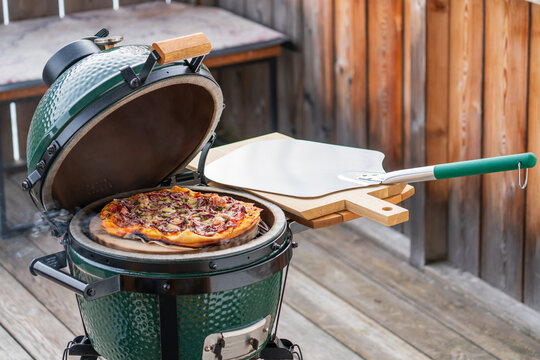outdoor grilling - ready to eat, pizza from a grill
