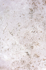 Surface of travertine stone in its natural color