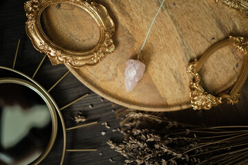 Raw crystal photography - Rose Quartz Pendulum