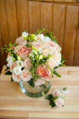 wedding bridal bouquet of roses and freesia 