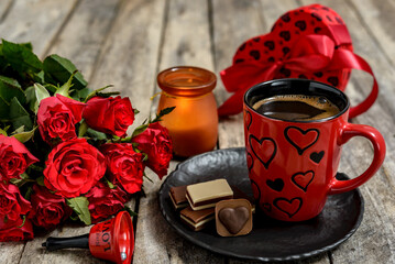 Cup of coffee with chocolates candies for Valentine's day or romantic morning