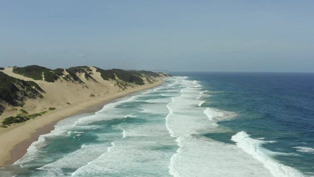 Aerial view of the ocean landscape in Mozambique. Beautiful nature of the coastline of the Indian Ocean with waves and sandy beaches.