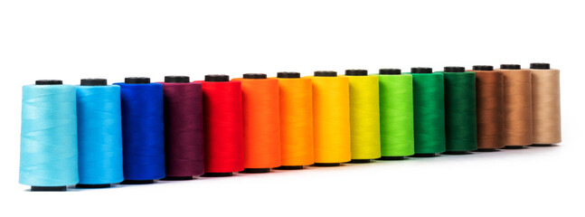 Spool of sewing thread, isolated on white background. Colored yarns used by factories in the...