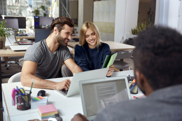 Business people working with laptops at office