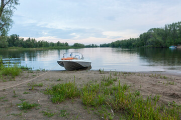 motor boat on the riverside
