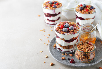 Healthy parfait with muesli berry sauce