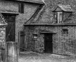 An old farm with brick buildings