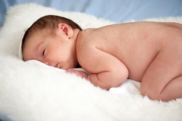 Fototapeta na wymiar Newborn baby in first week of his life